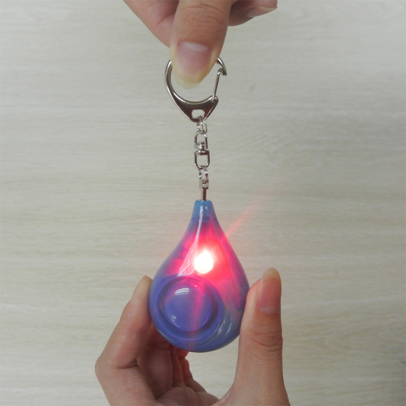Personal Alarm Keychain - Dispositivo Anti-aggressione per Donne a Forma